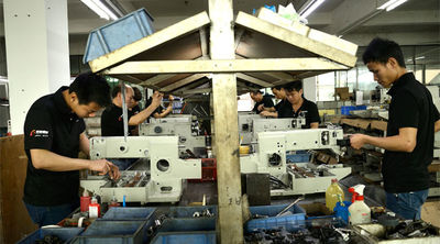 Κίνααυτόματη βιομηχανική ράβοντας μηχανήεπιχείρηση